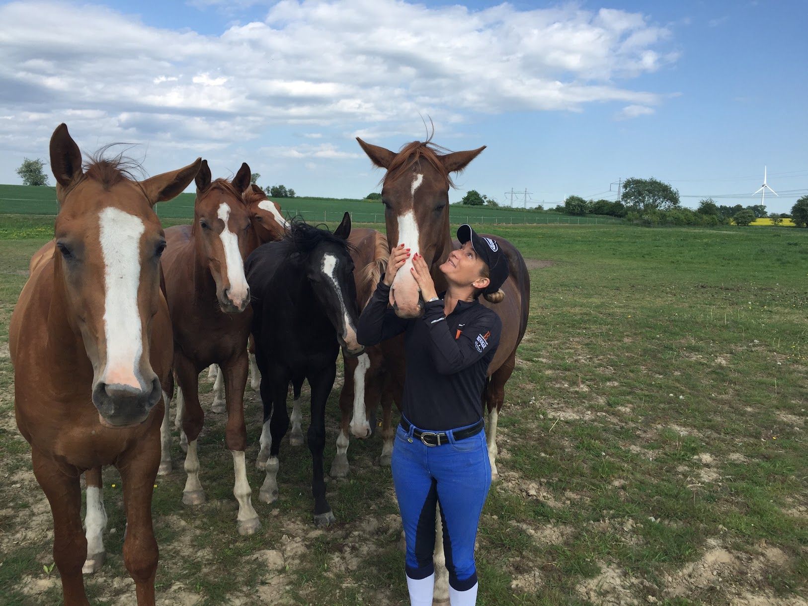 Elizabeth Landers with young stallions at Dalhem Farms